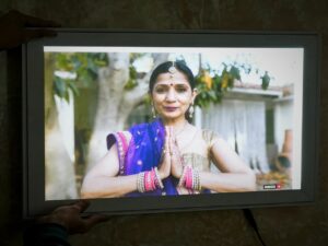 LED photo frame with a picture of a women